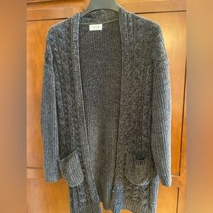 Hunter green open cardigan.